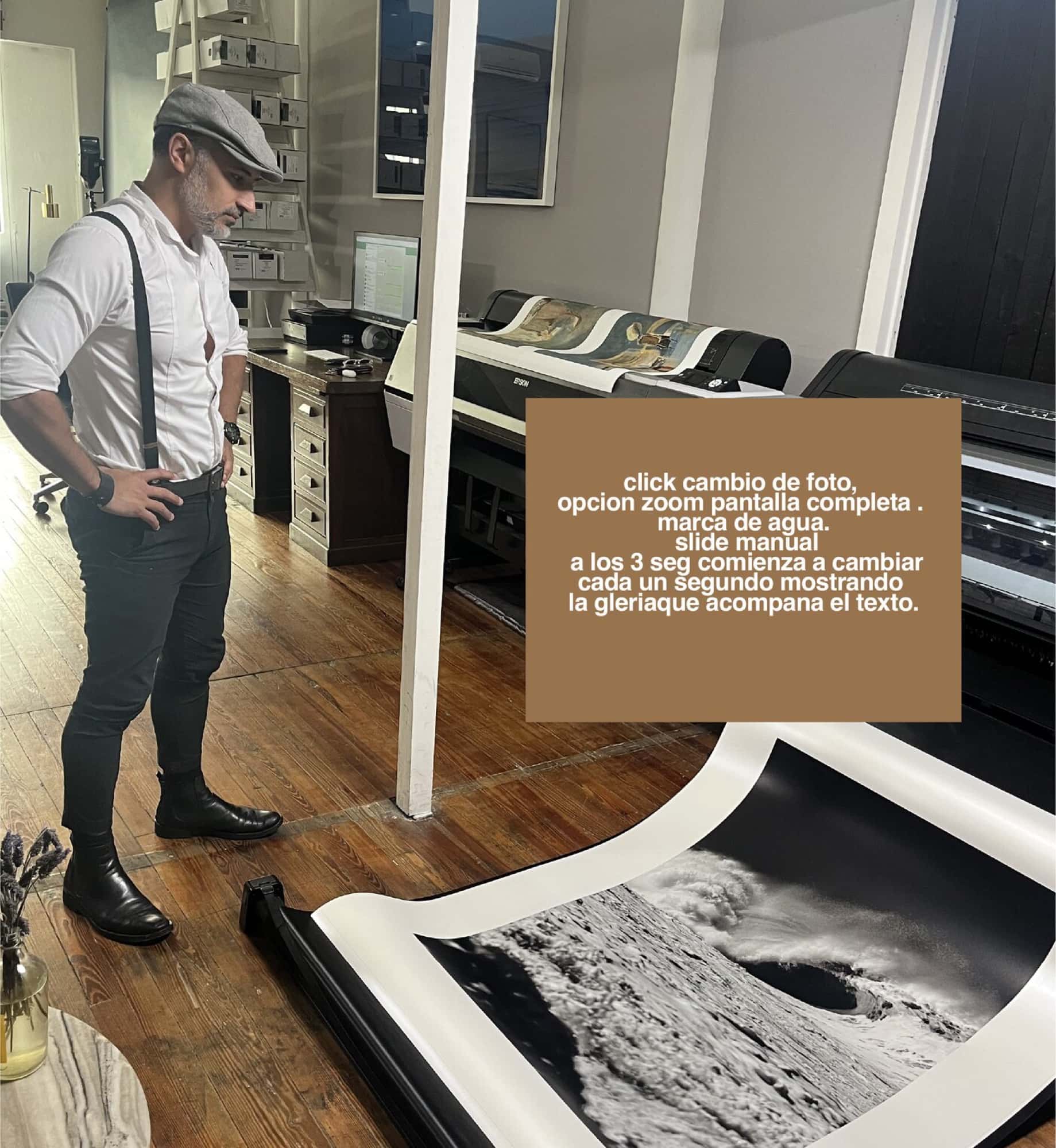 Nicolás Albano en el taller, junto a las impresoras y una copia recién salida